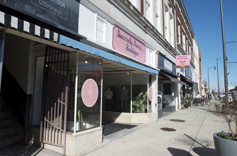 Young entrepreneur running her own boutique
